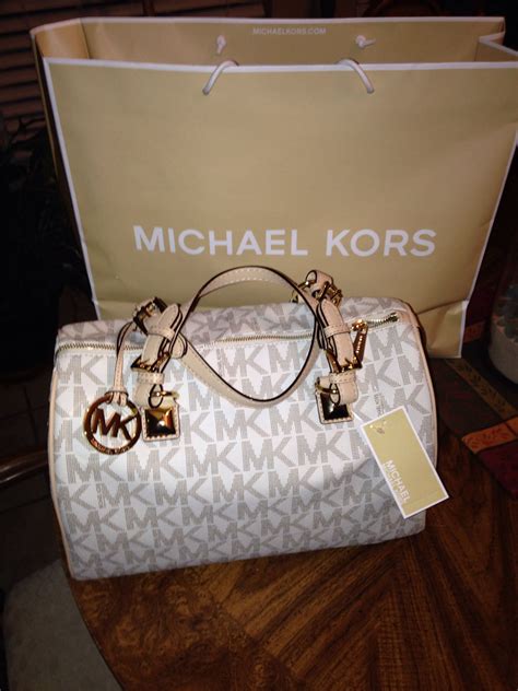 cheap real michael kors purses|real michael kors bag inside.